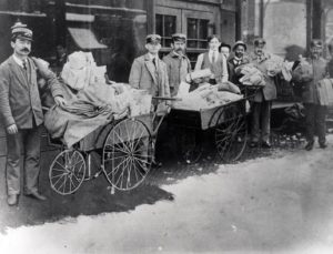 photograph of letter carriers with their handcarts